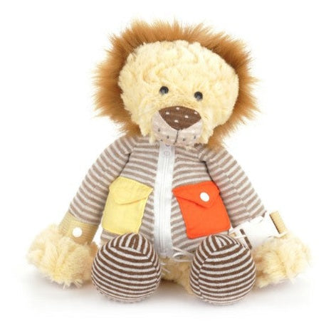 Stuffed lion toy with striped shirt and colorful pockets.